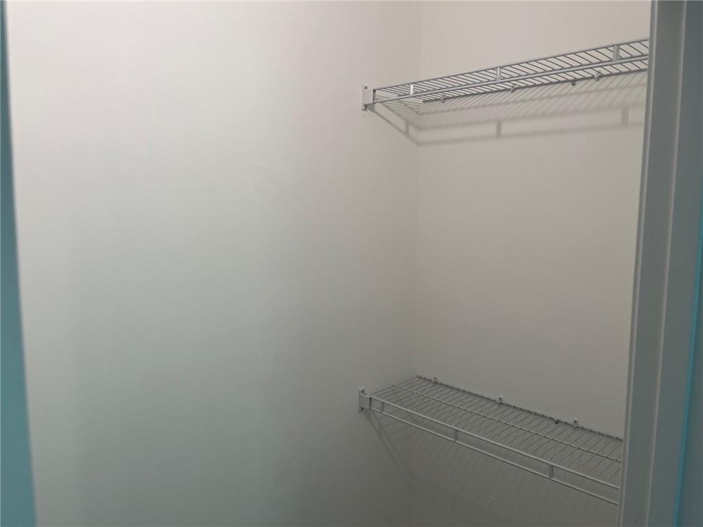 202 Gamel Road Dallas, GA 30157 - Photo 16 of 34 a view of a room with racks on the wall