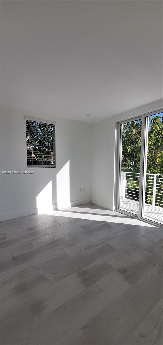 3787 Thomas, Unit 3787 Miami, FL 33133 - Photo 15 of 22 a view of an empty room with a window