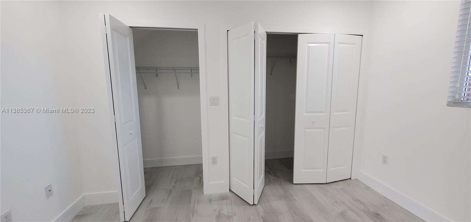 3787 Thomas, Unit 3787 Miami, FL 33133 - Photo 17 of 22 a view of an empty room with closet and wooden floor