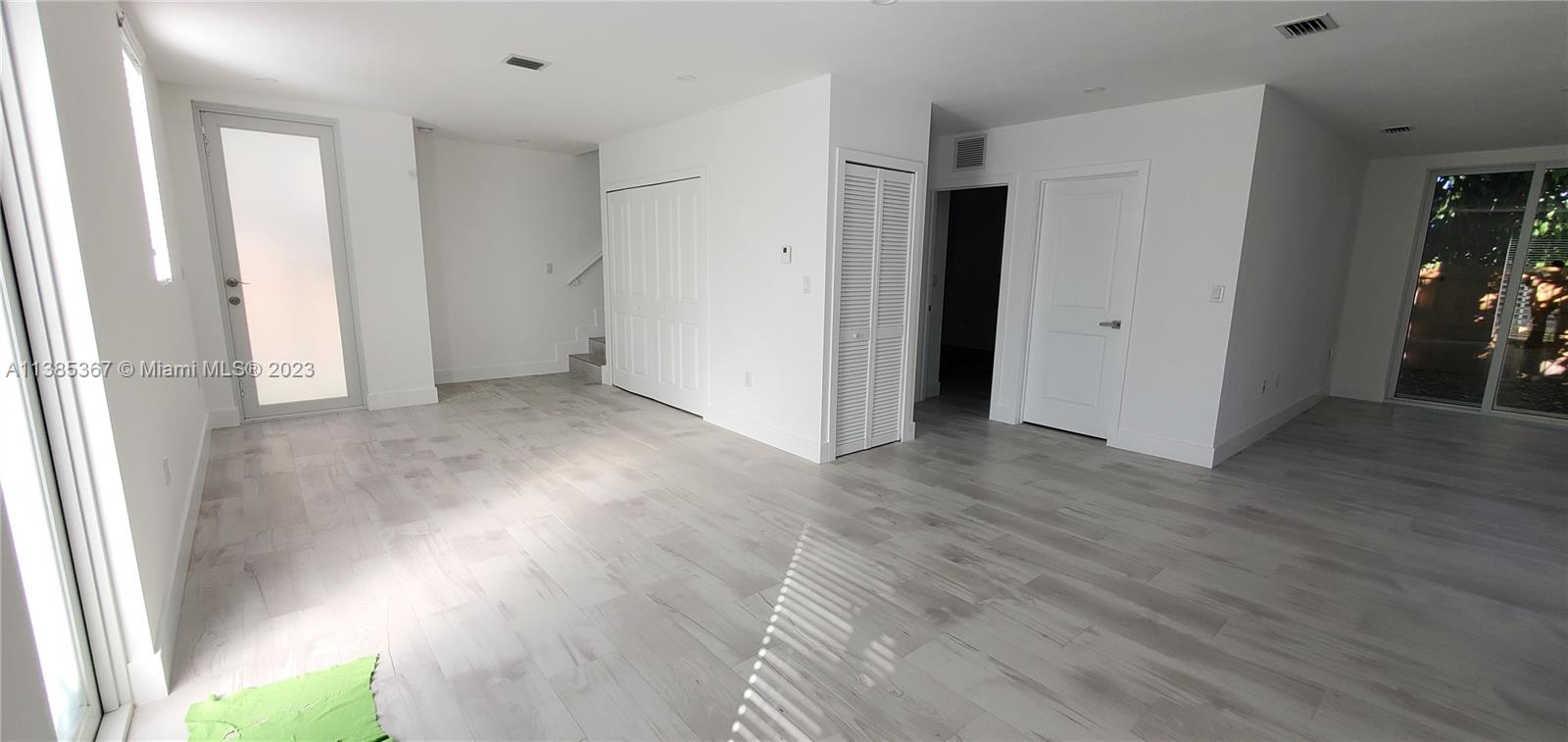 3787 Thomas, Unit 3787 Miami, FL 33133 - Photo 5 of 22 a view of hallway with wooden floor