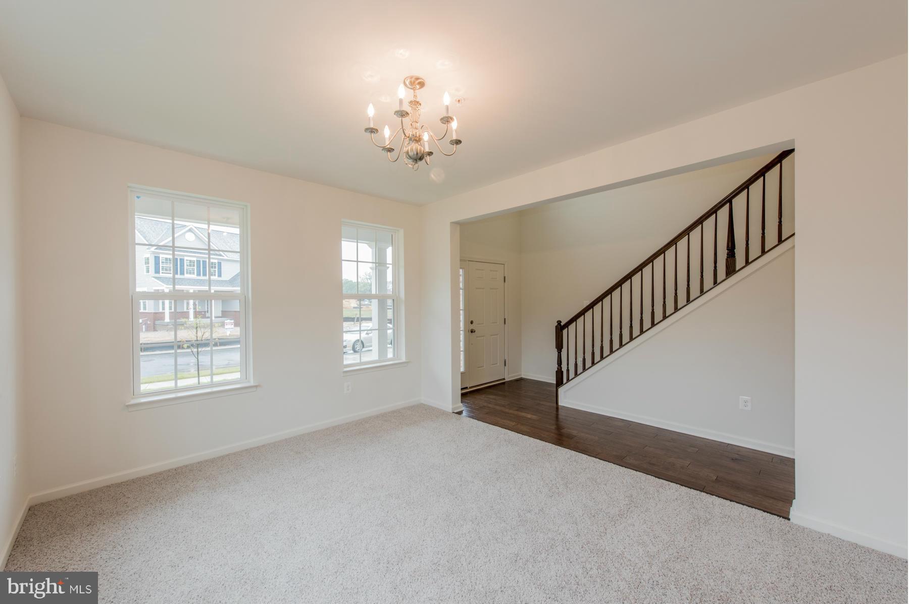 10515 Braddock Run Road Middle River, MD 21220 - Photo 3 of 27 a view of an empty room with windows
