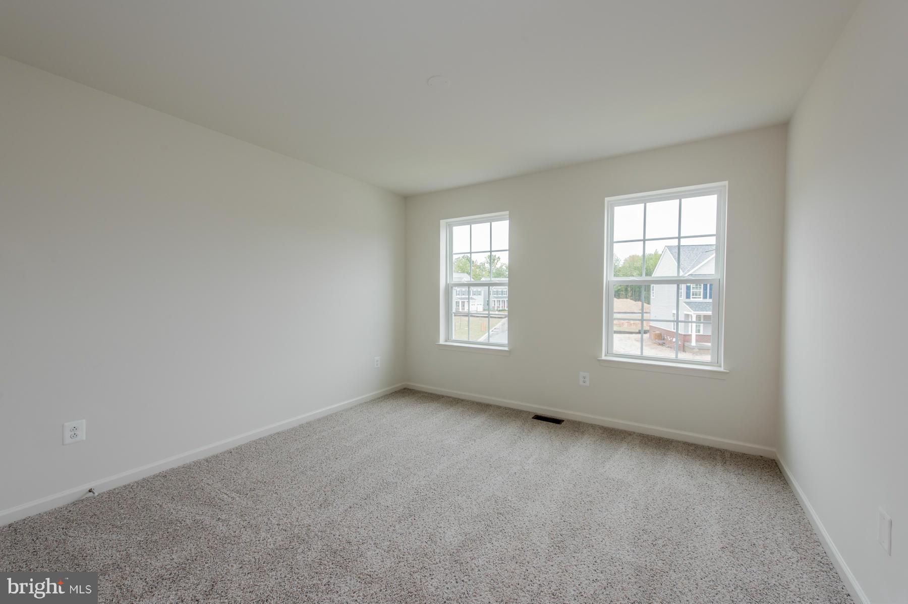 10515 Braddock Run Road Middle River, MD 21220 - Photo 22 of 27 an empty room with windows
