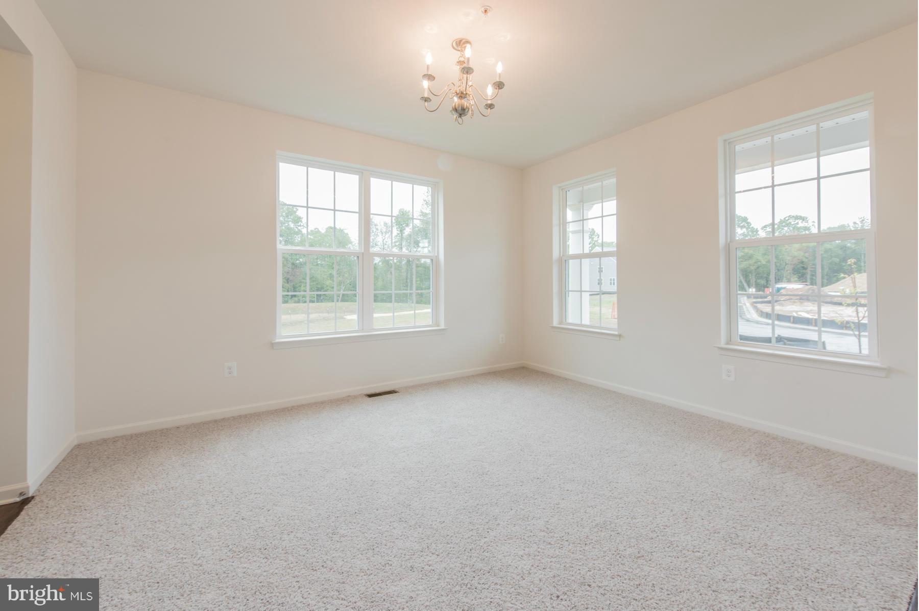 10515 Braddock Run Road Middle River, MD 21220 - Photo 5 of 27 a view of an empty room with a window