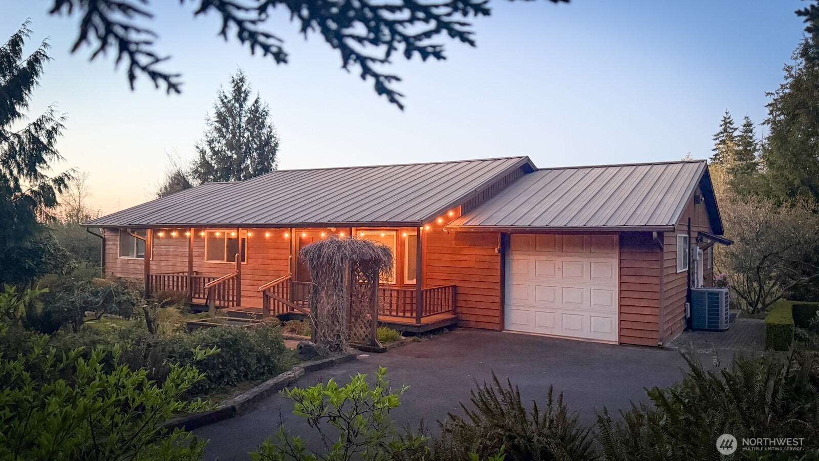 207 Tillicum Drive Chehalis, WA 98532 - Photo 1 of 40 a view of a house with backyard and garden