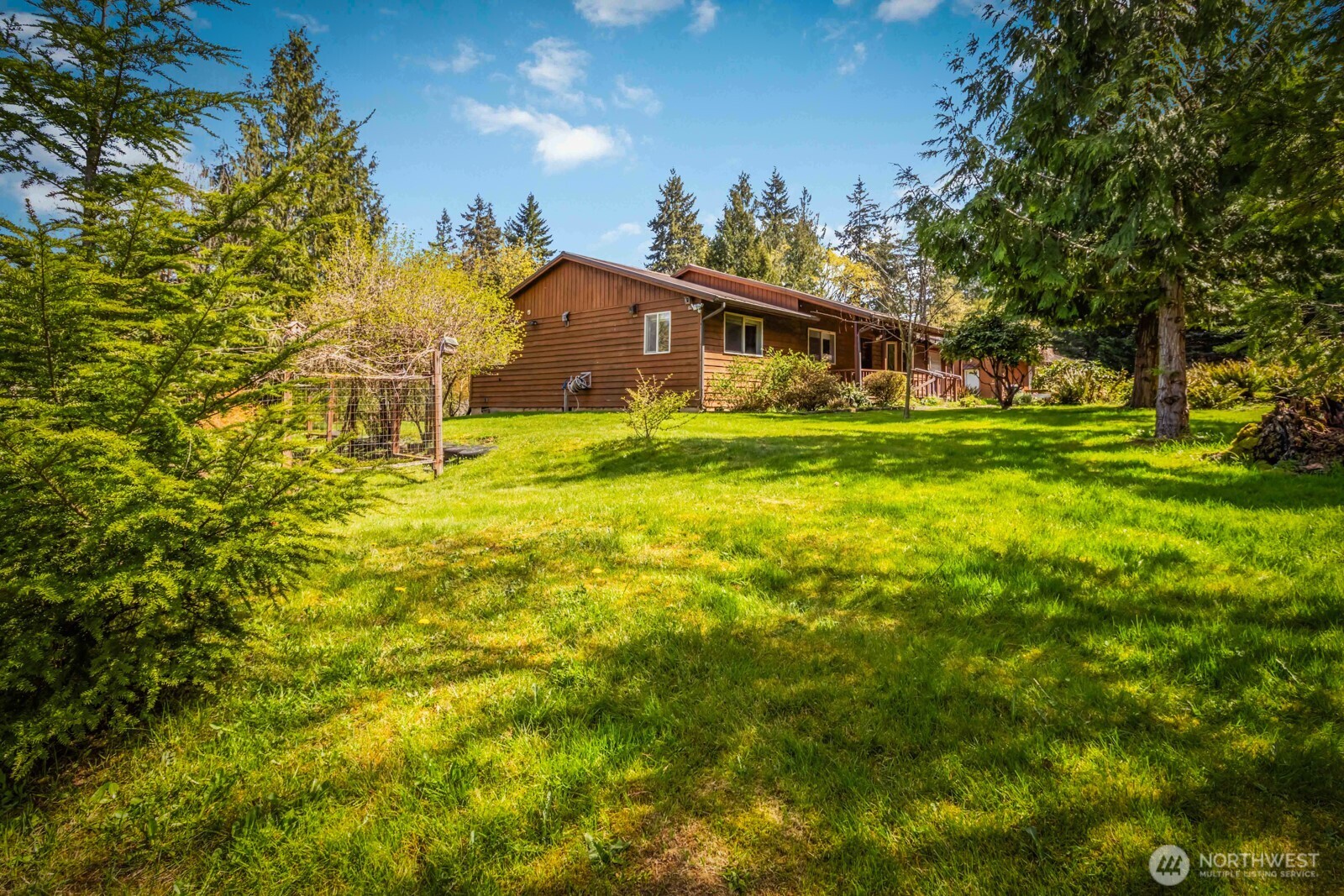 207 Tillicum Drive Chehalis, WA 98532 - Photo 14 of 40 a front view of house with yard and trees