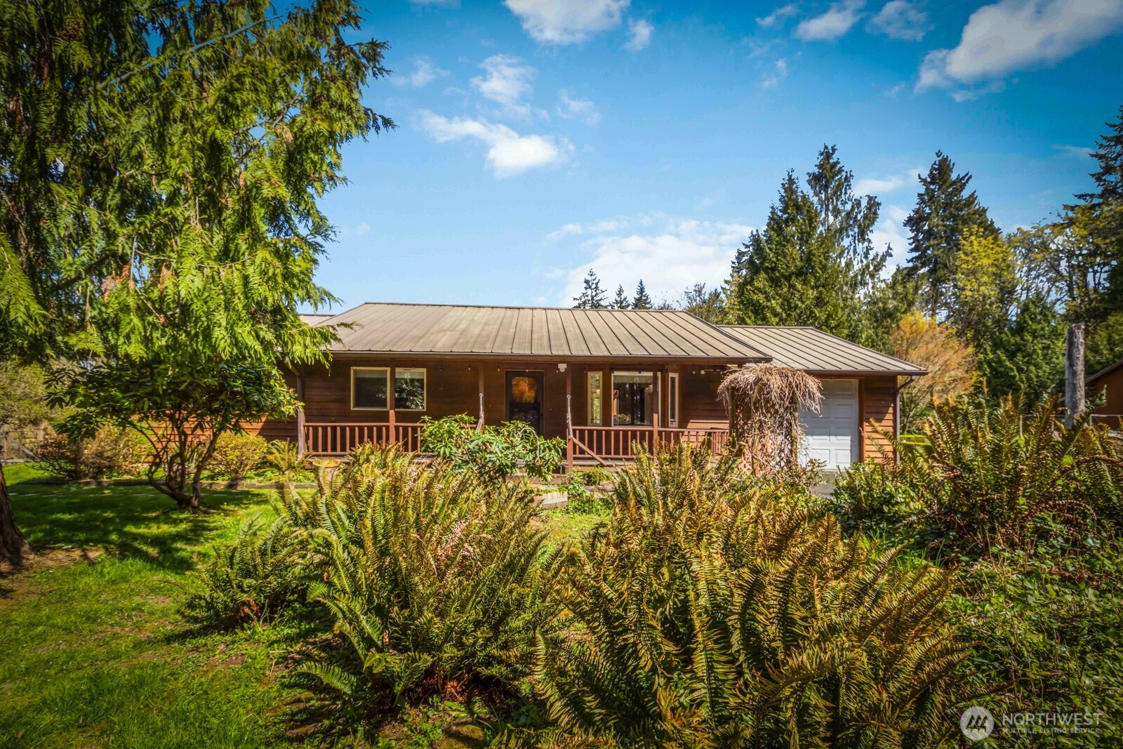 207 Tillicum Drive Chehalis, WA 98532 - Photo 37 of 40 a aerial view of a house with a yard and potted plants