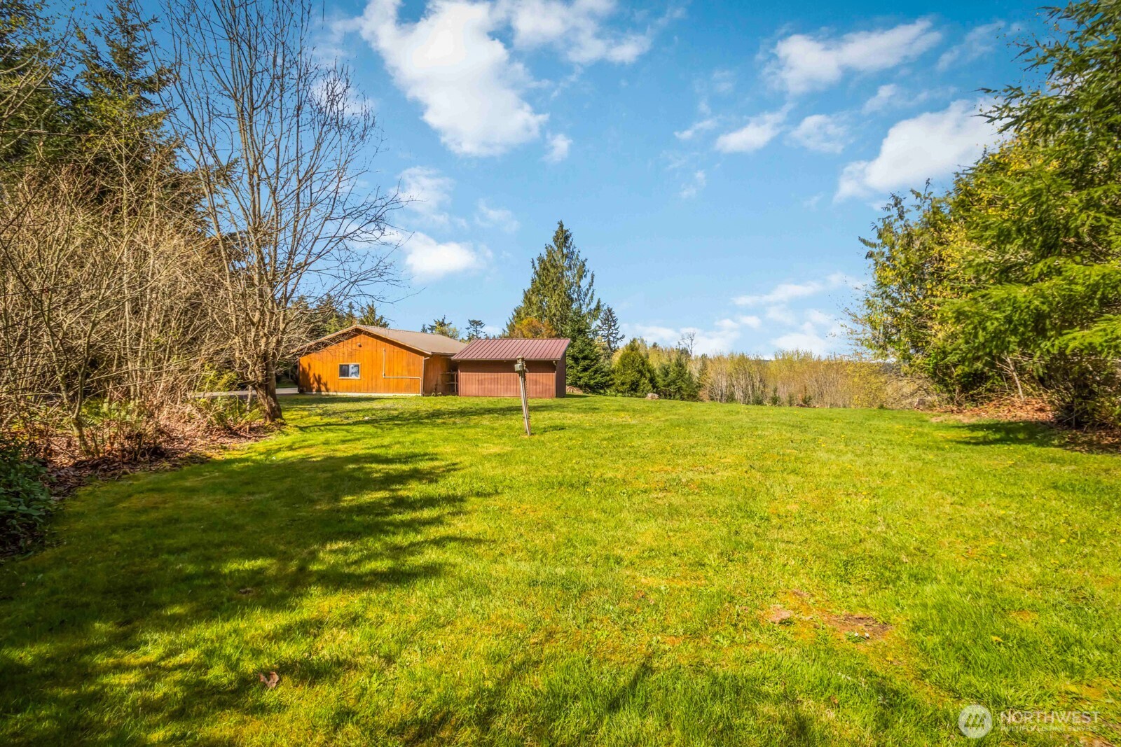 207 Tillicum Drive Chehalis, WA 98532 - Photo 7 of 40 a view of a house with a big yard