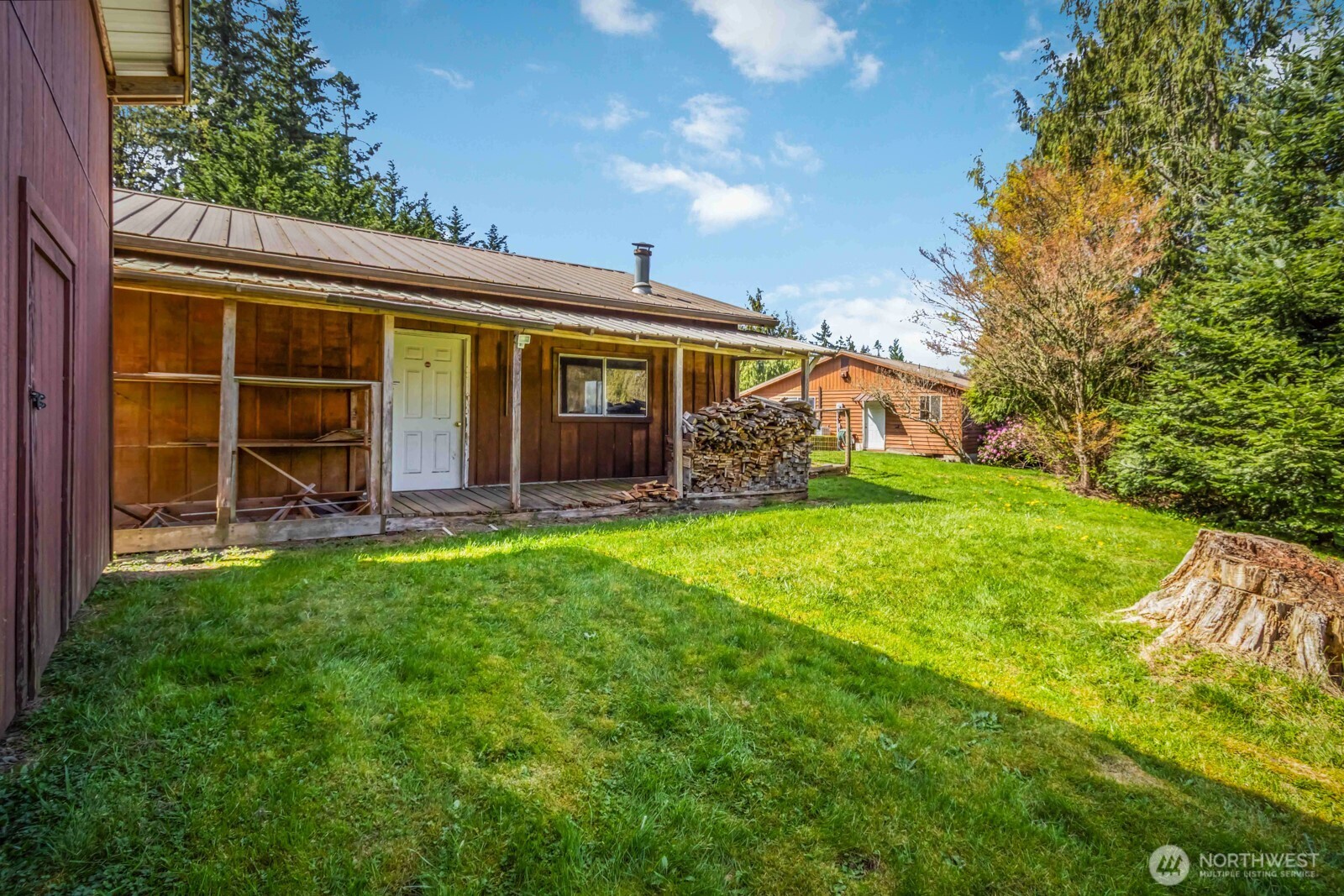 207 Tillicum Drive Chehalis, WA 98532 - Photo 8 of 40 a view of a house with backyard and porch