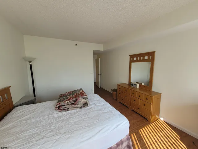 a bathroom with a shower and a mirror
