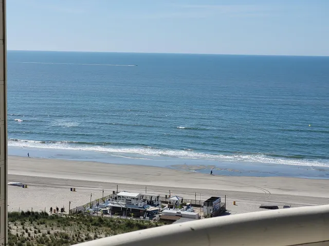 a front view of a building with glass windows