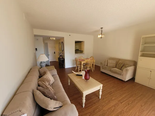 a kitchen with wooden cabinets and a stove top oven