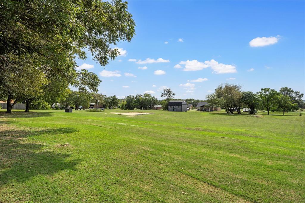 215 Lajuana Drive Waco, TX 76705 - Photo 30 of 33 View of home's community featuring a yard