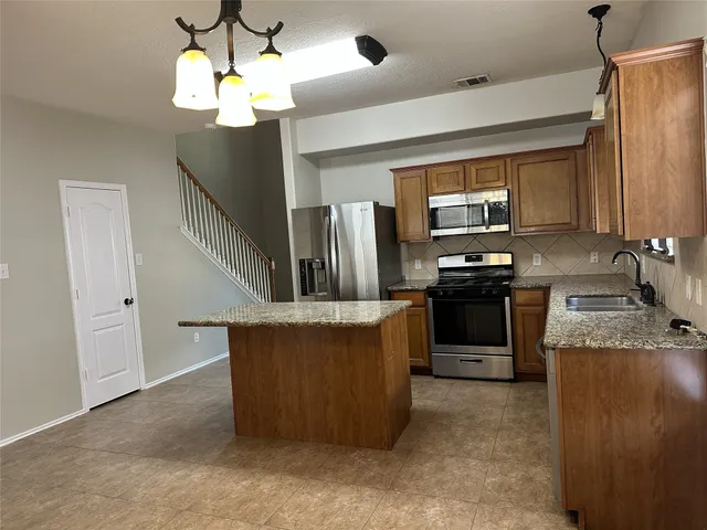 a view of entryway with a front door