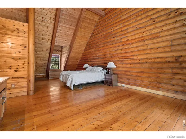 a bathroom with a sink a toilet and a shower