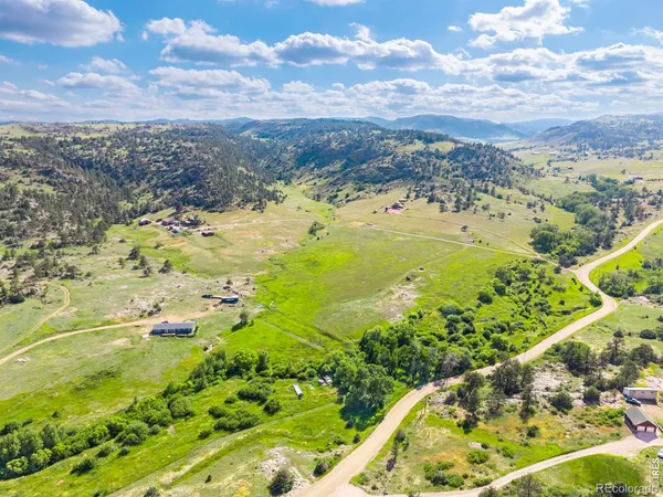 a view of a city with an ocean beach