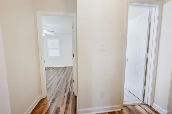 a view of a room with racks on the wall