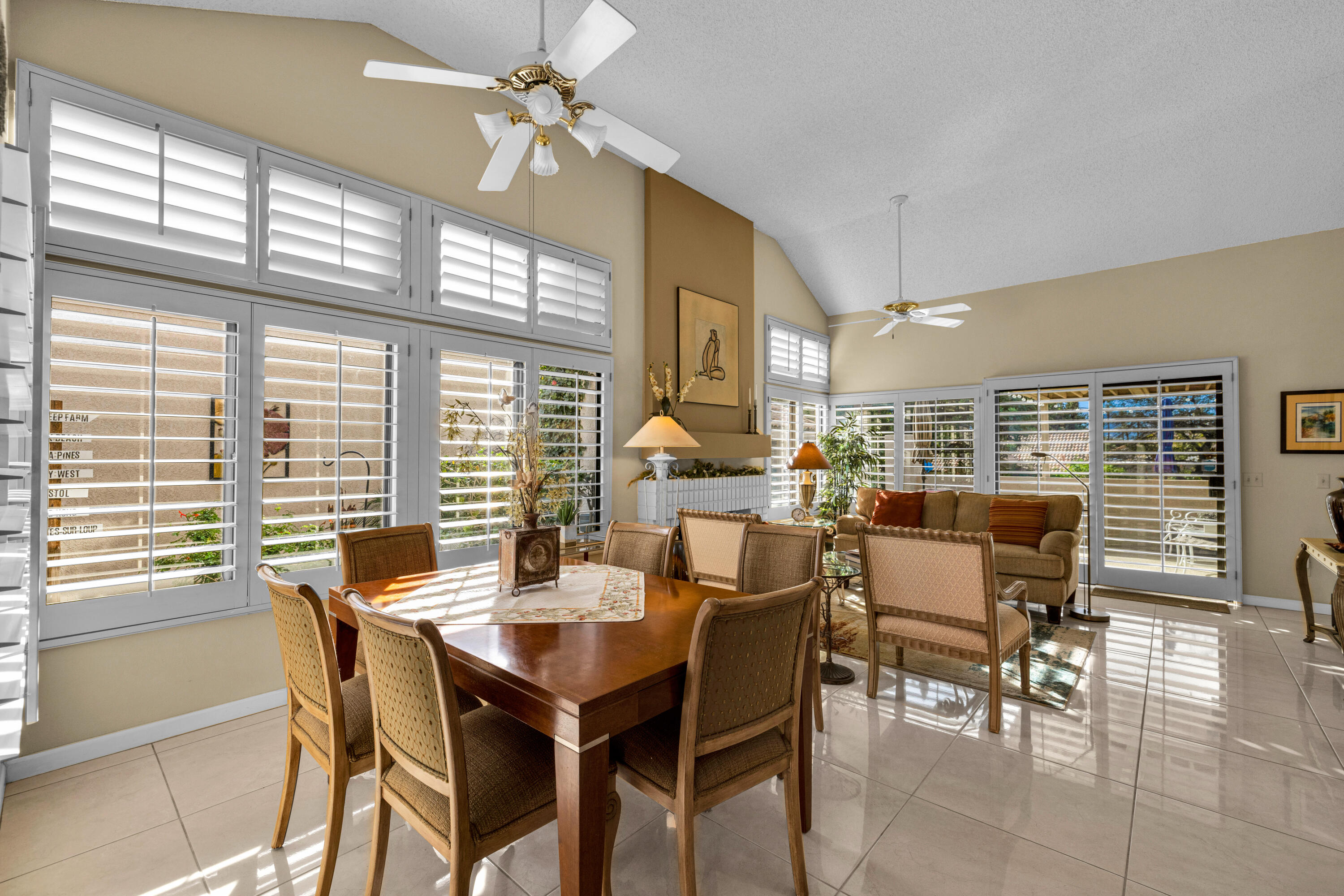 45 Verde Way Palm Desert, CA 92260 - Photo 12 of 48 a view of a dining room with furniture window and outside view