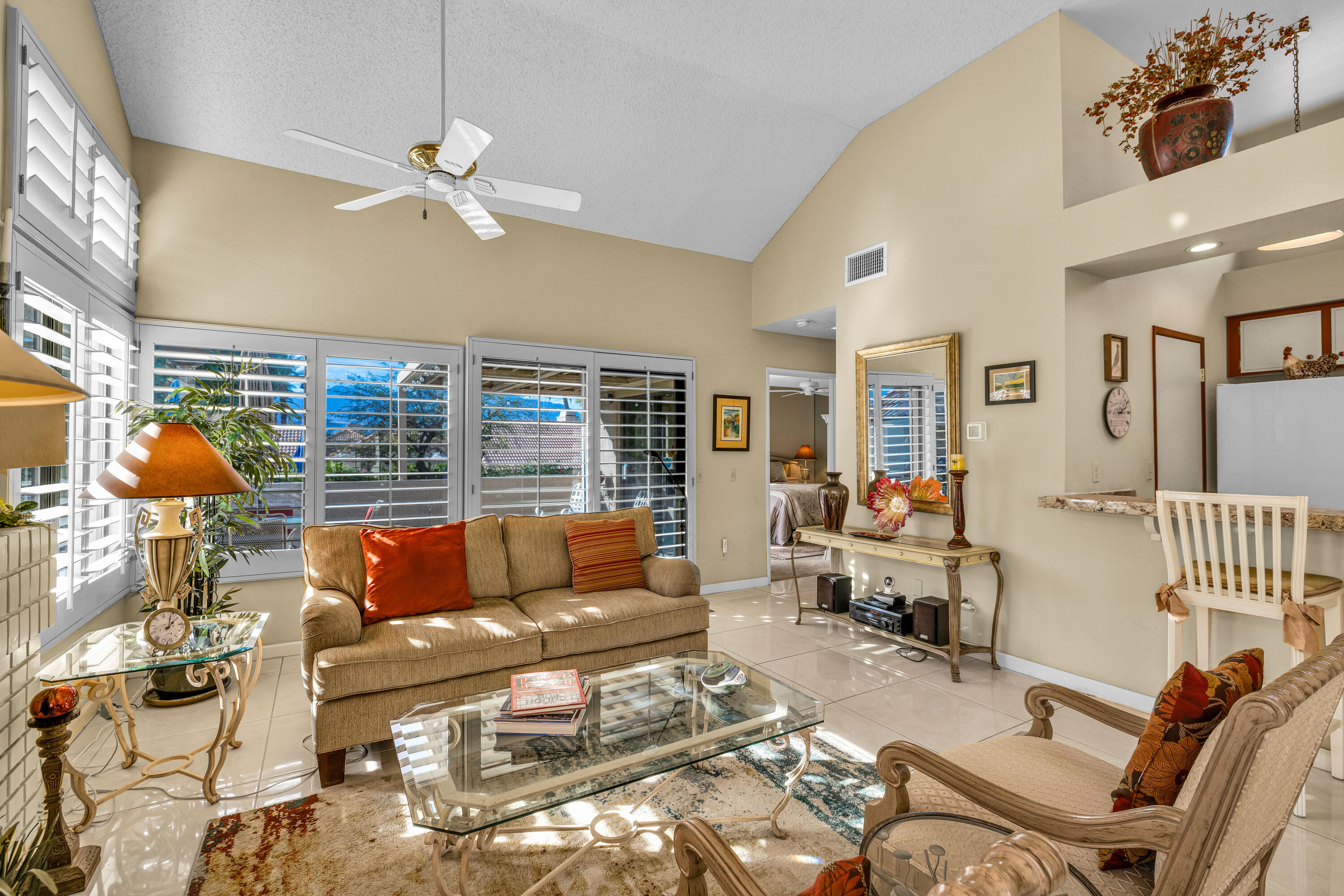 45 Verde Way Palm Desert, CA 92260 - Photo 14 of 48 a living room with furniture and wooden floor