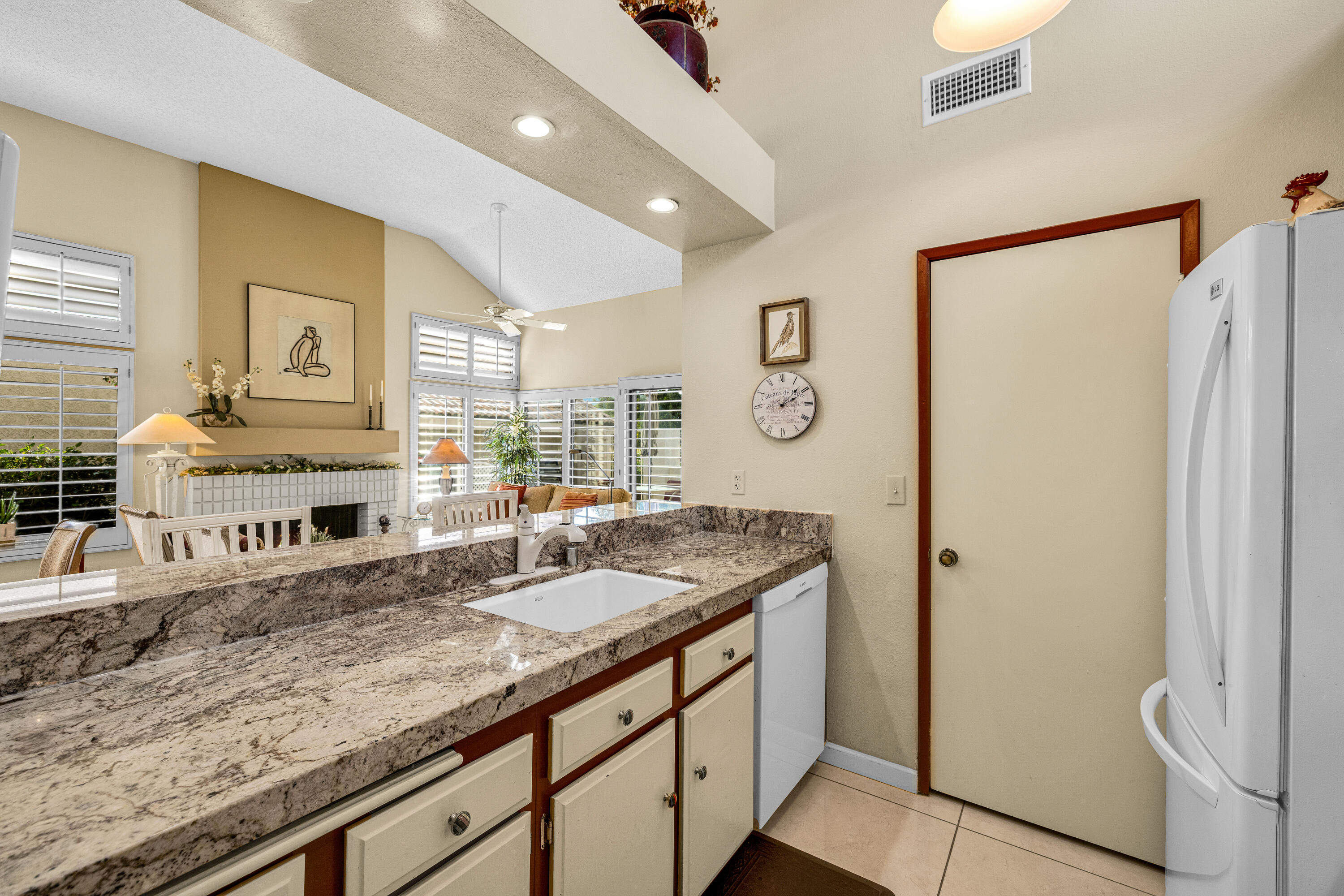 45 Verde Way Palm Desert, CA 92260 - Photo 22 of 48 a bathroom with sink and mirror