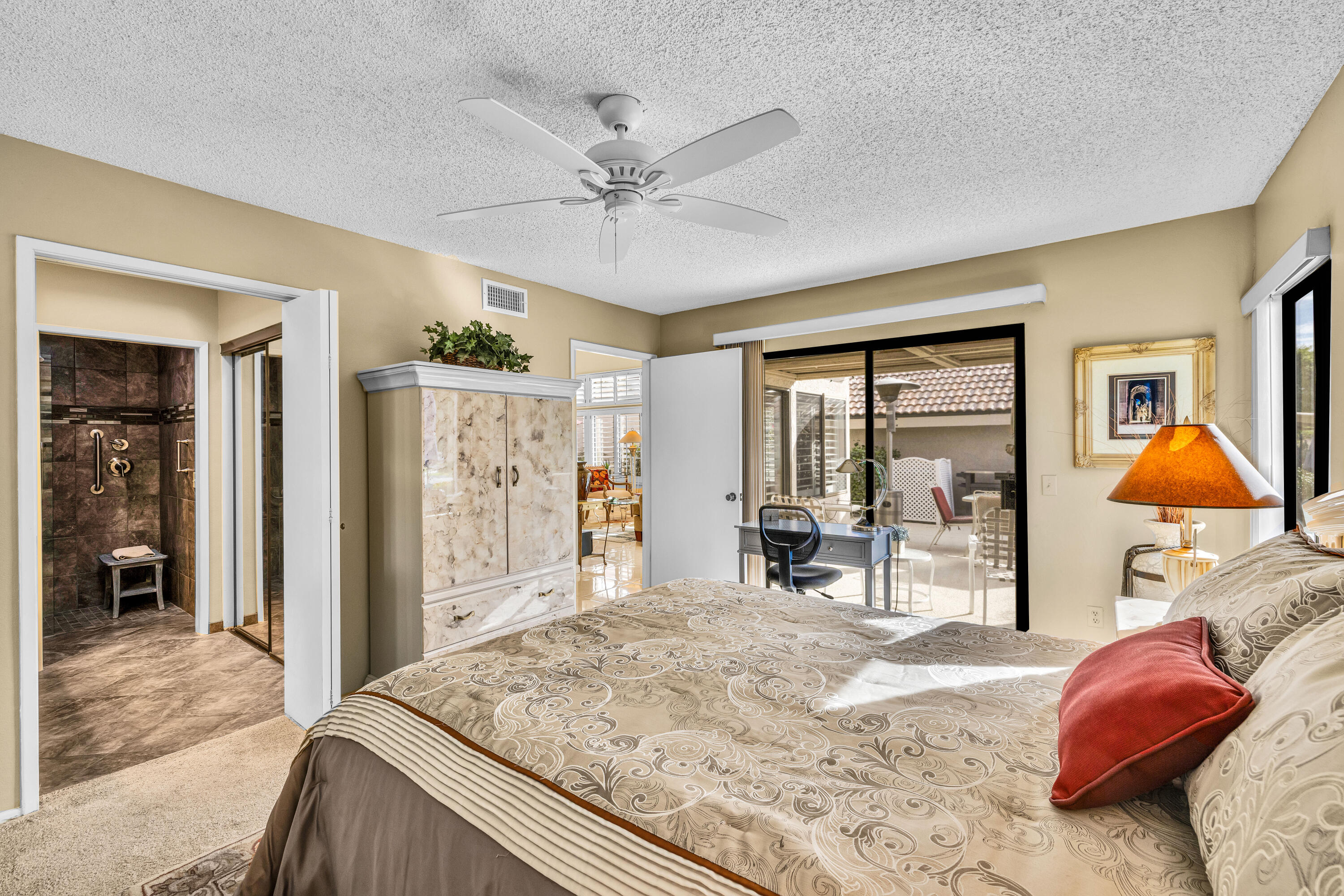 45 Verde Way Palm Desert, CA 92260 - Photo 27 of 48 a bedroom with a bed and window