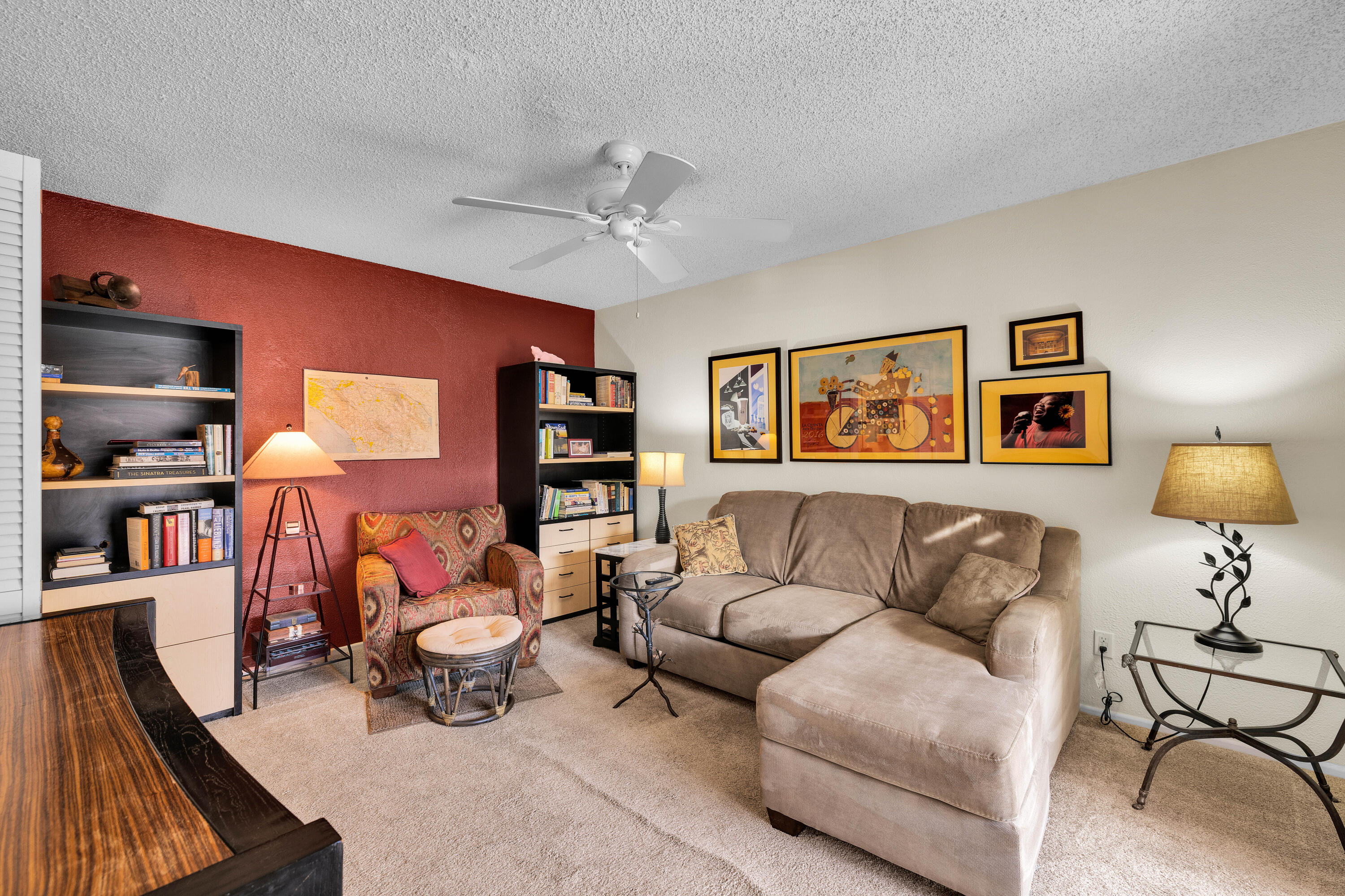 45 Verde Way Palm Desert, CA 92260 - Photo 30 of 48 a living room with furniture a ceiling fan and a rug