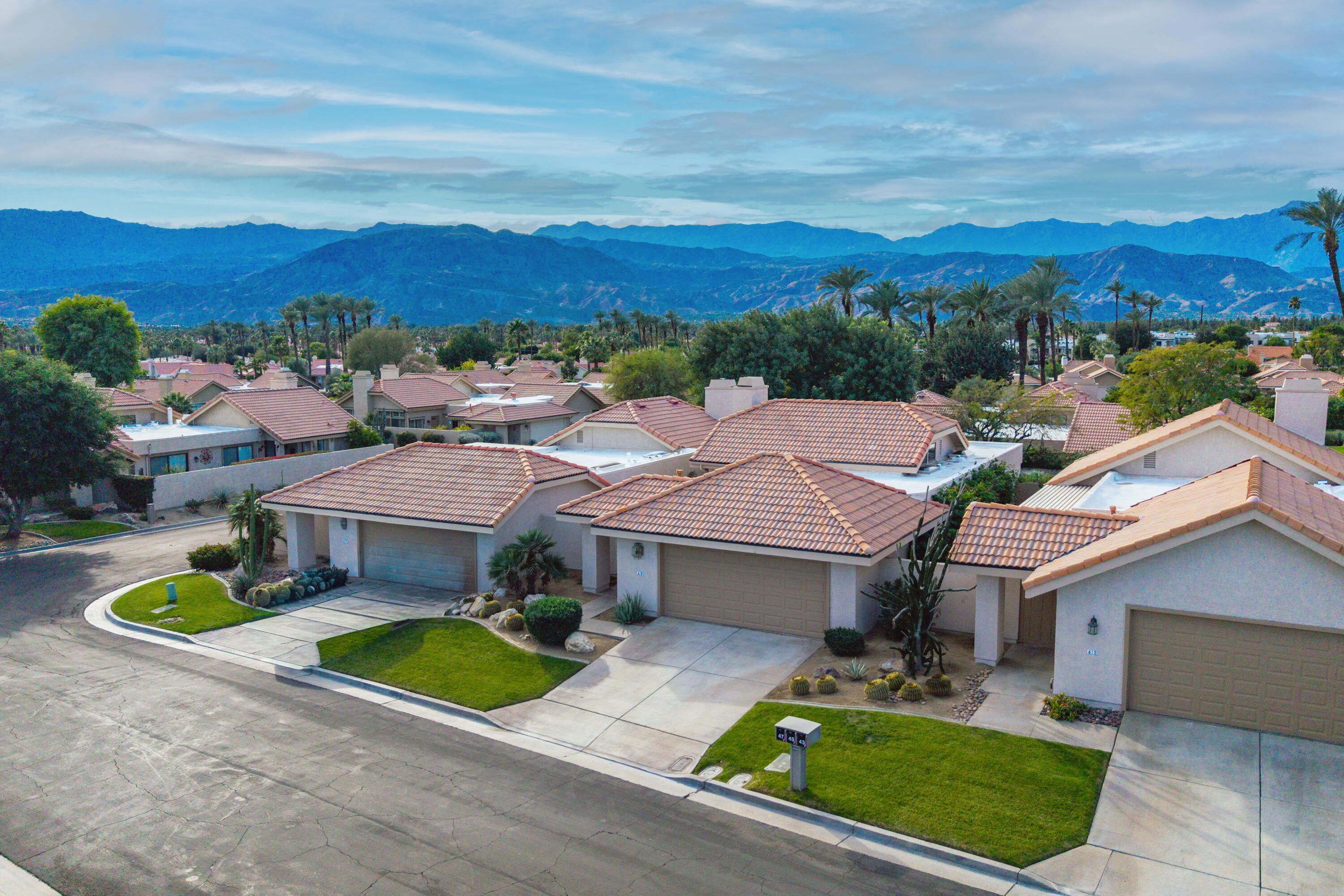 45 Verde Way Palm Desert, CA 92260 - Photo 41 of 48 an aerial view of a house with a garden and mountain view