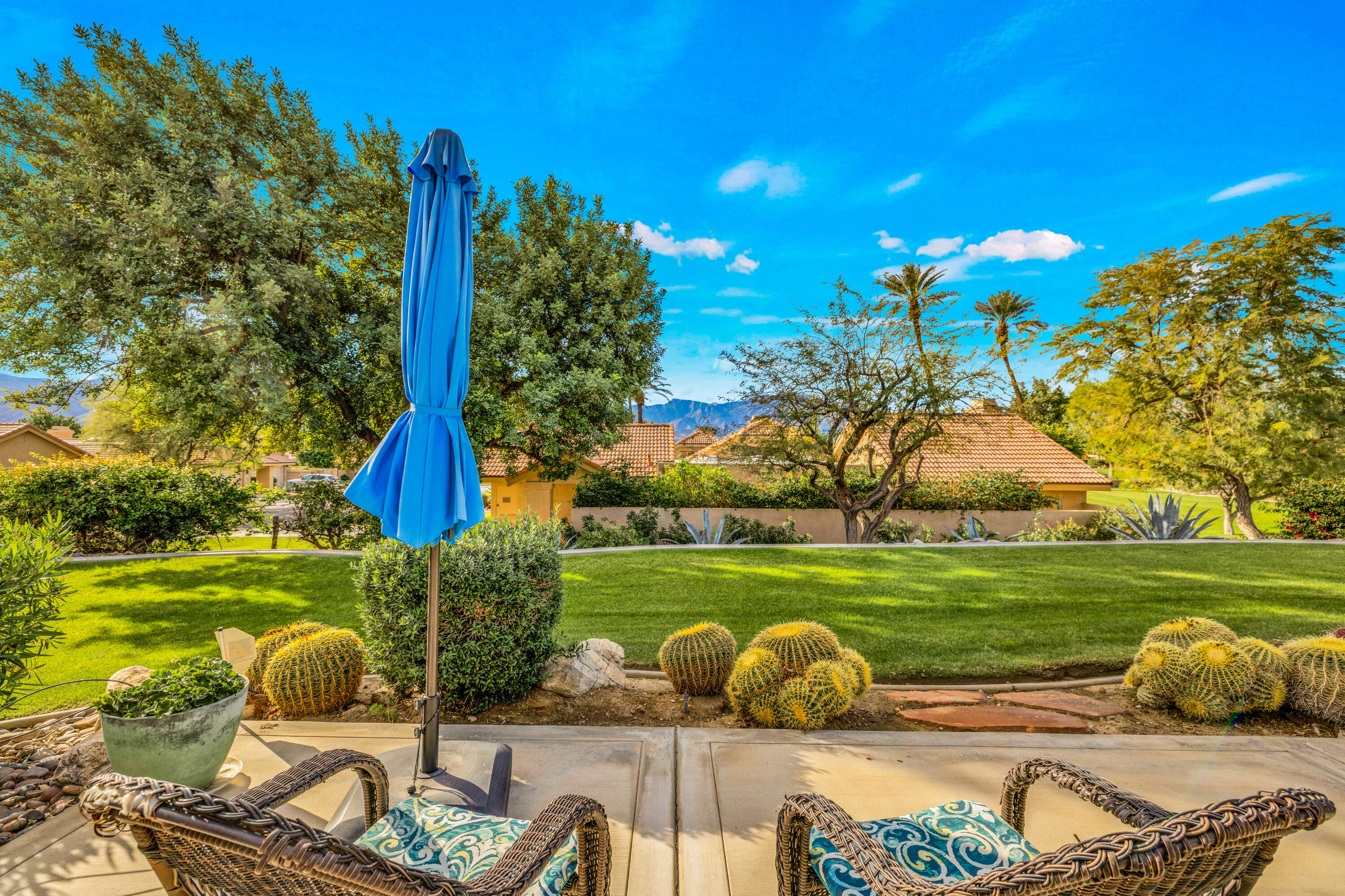 45 Verde Way Palm Desert, CA 92260 - Photo 9 of 48 a front view of a house with garden