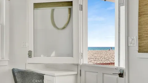 a bathroom with a bathtub and a window