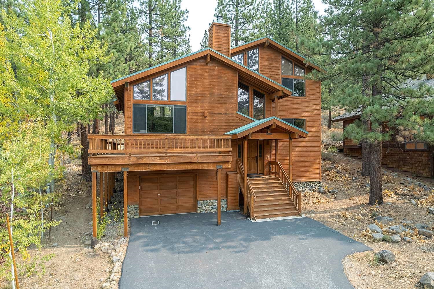 342 Skidder Trail Truckee, CA 96161 - Photo 1 of 21 a front view of a house with a yard