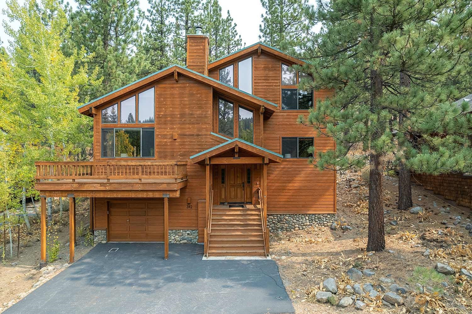 342 Skidder Trail Truckee, CA 96161 - Photo 21 of 21 a front view of a house with a yard and garage