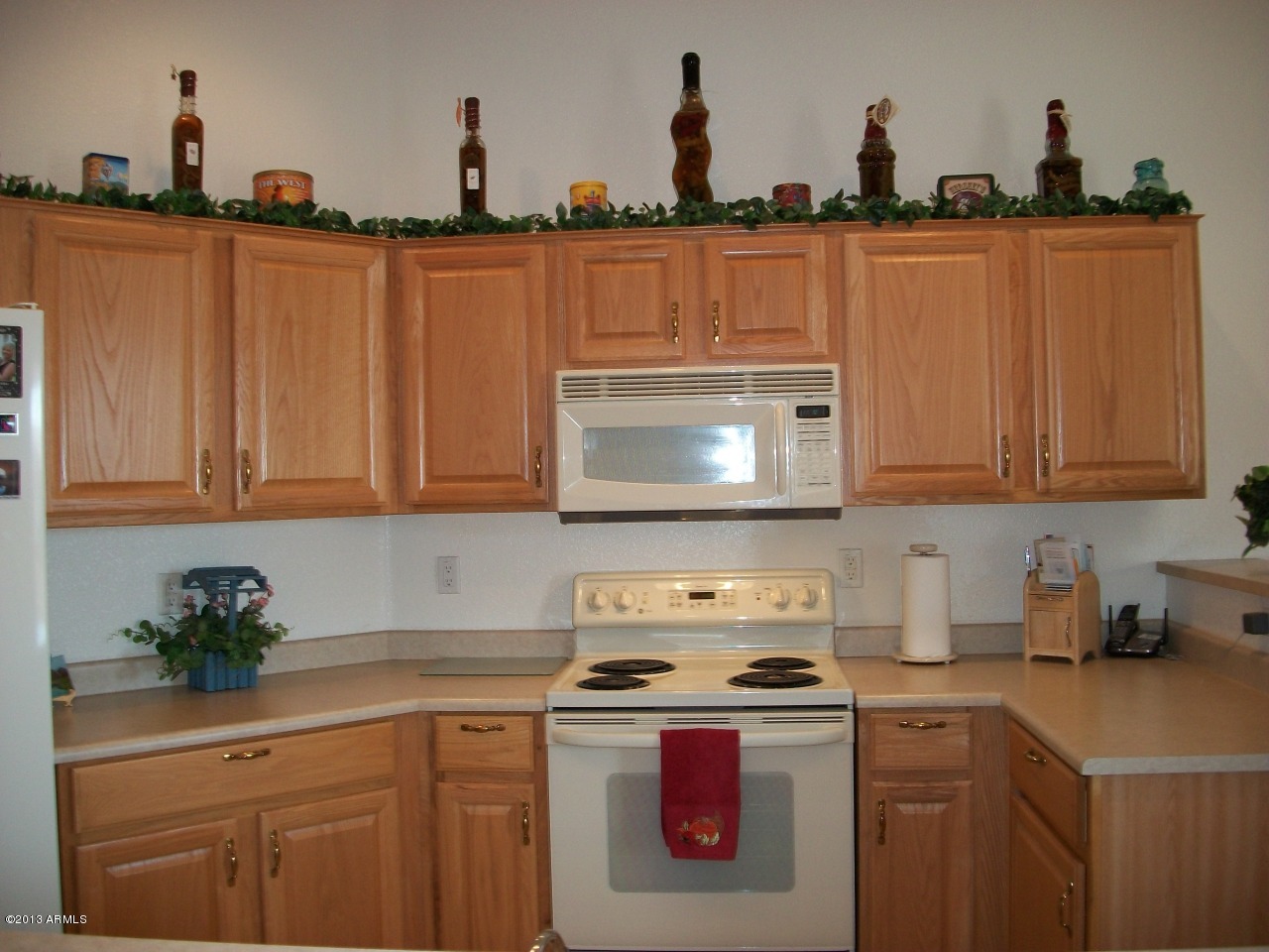 4133 East Walnut Road Gilbert, AZ 85298 - Photo 2 of 17 Raised Cabinets and Ample Prep Area