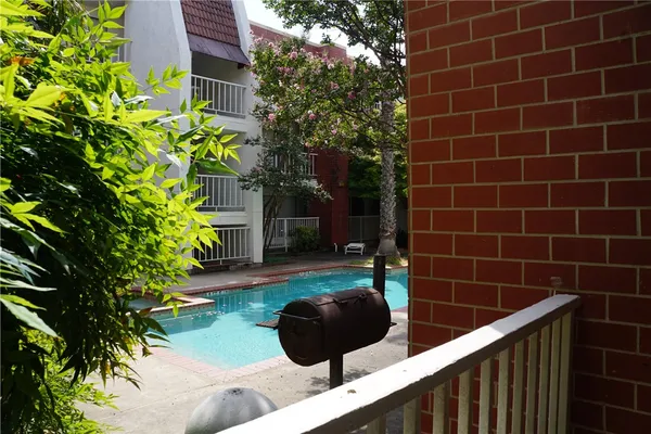 a view of a sink and table in the back yard