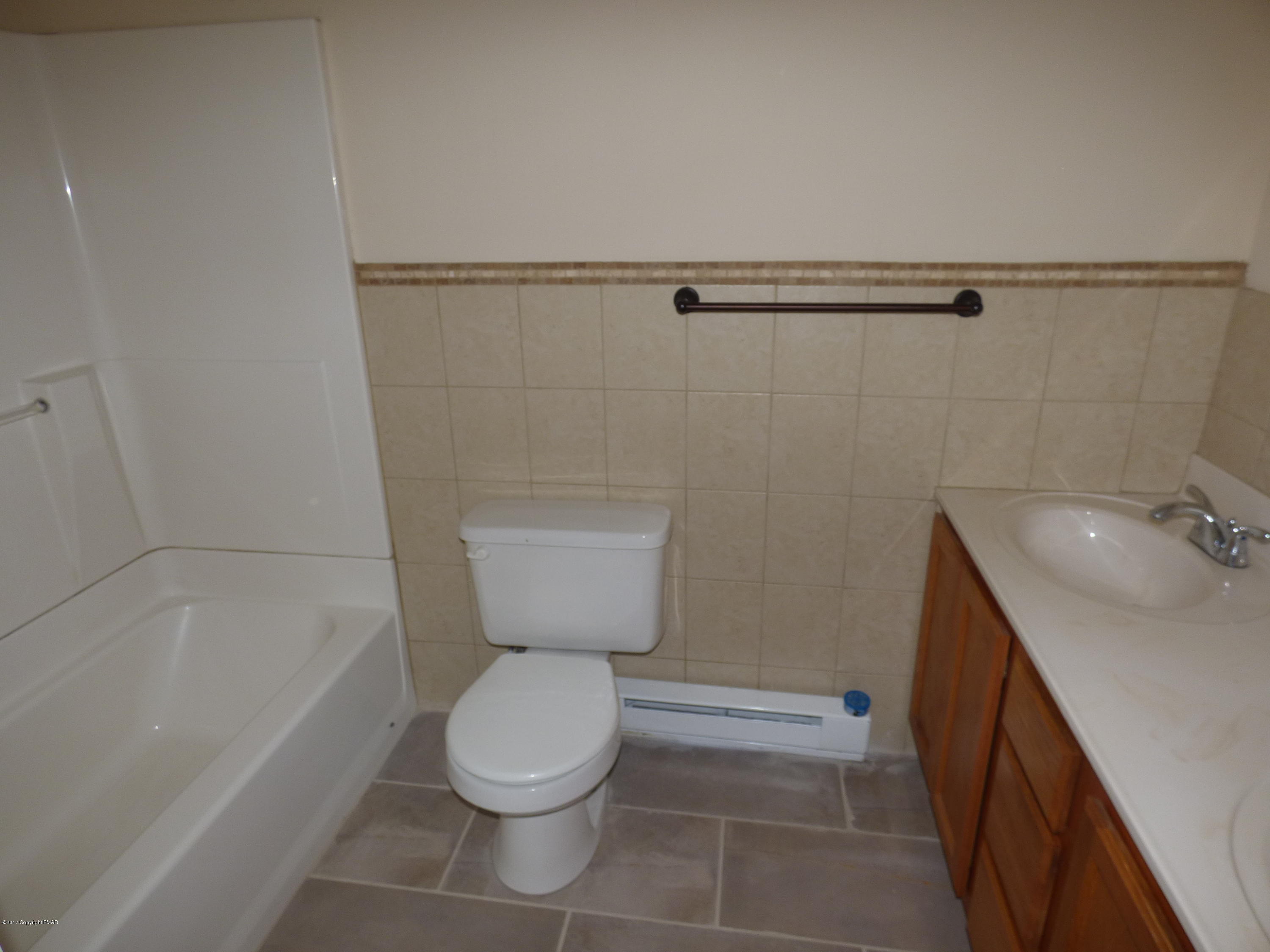 1178 Mattioli Road Bartonsville, PA 18321 - Photo 14 of 21 a bathroom with a sink a toilet and shower