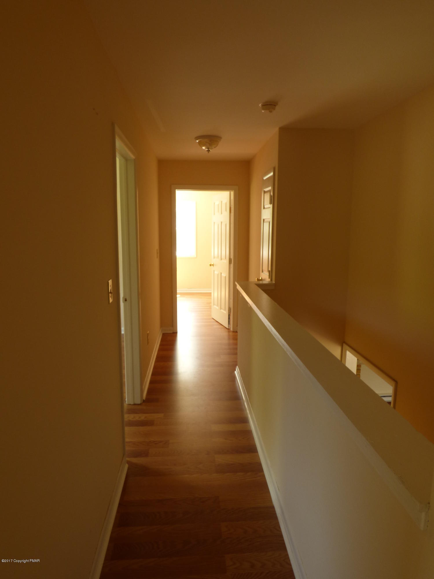 1178 Mattioli Road Bartonsville, PA 18321 - Photo 17 of 21 a view of a hallway with wooden floor