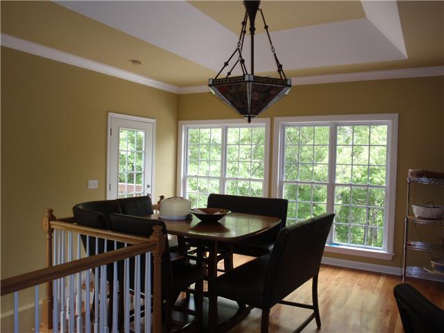 9151 Buck Litton Road Lyles, TN 37098 - Photo 11 of 20 a table and chairs in a room with a window