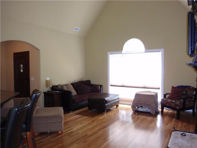 9151 Buck Litton Road Lyles, TN 37098 - Photo 14 of 20 a living room with furniture or window and a wooden floor