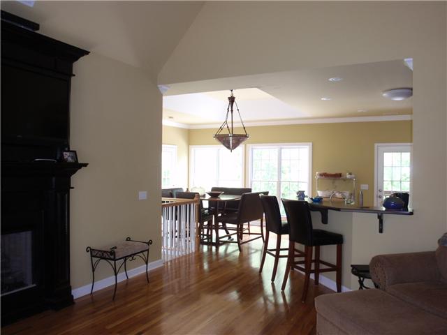 9151 Buck Litton Road Lyles, TN 37098 - Photo 16 of 20 a view of a dining room with furniture window and wooden floor