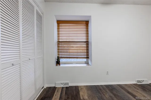 a view of a room that has a window