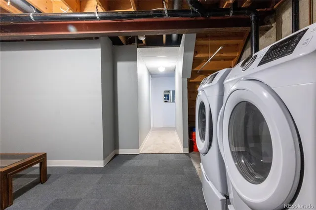 a view of a utility room with washer and dryer