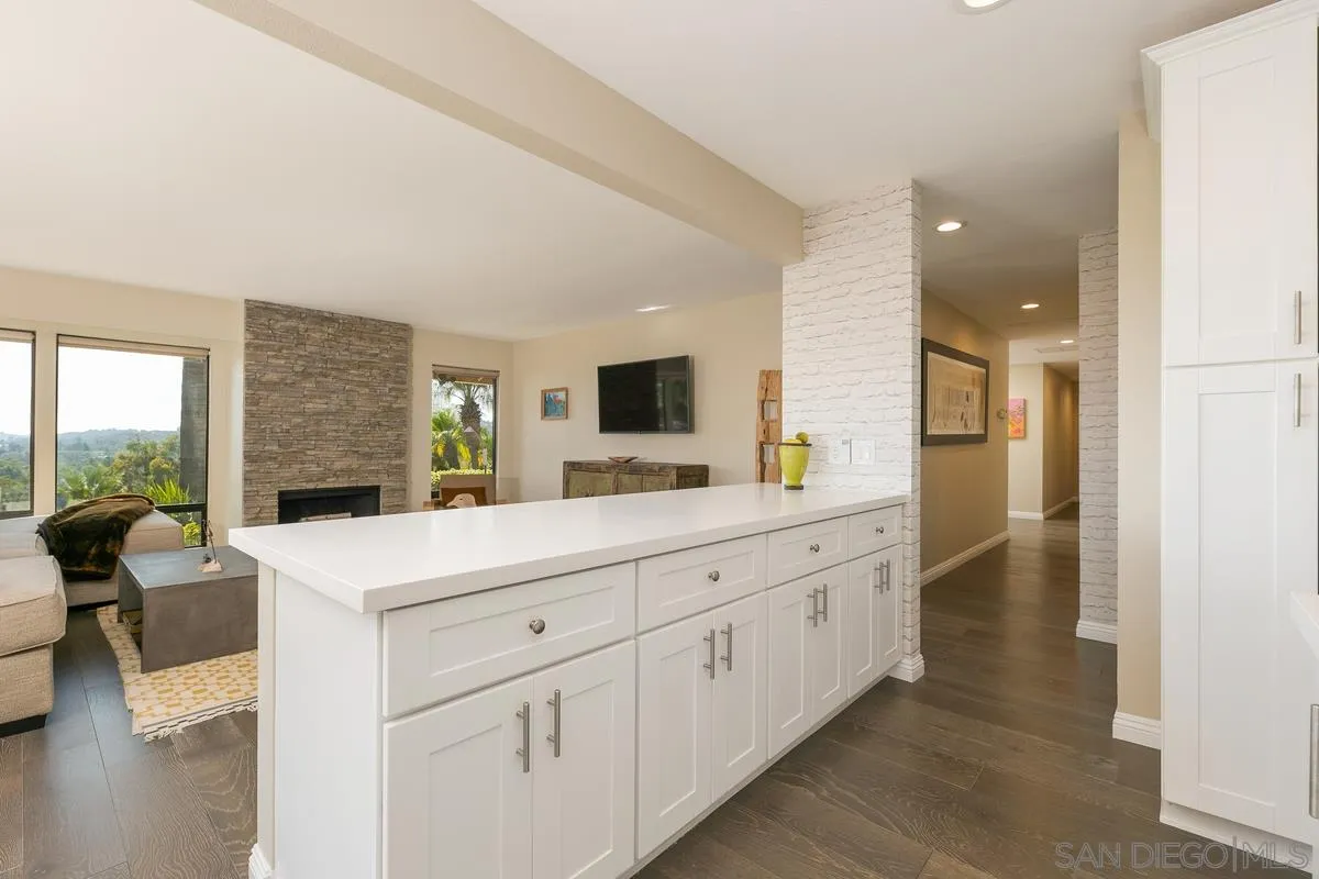 1122 Rancho Encinitas Drive Encinitas, CA 92024 - Photo 14 of 39 a large white kitchen with a large window