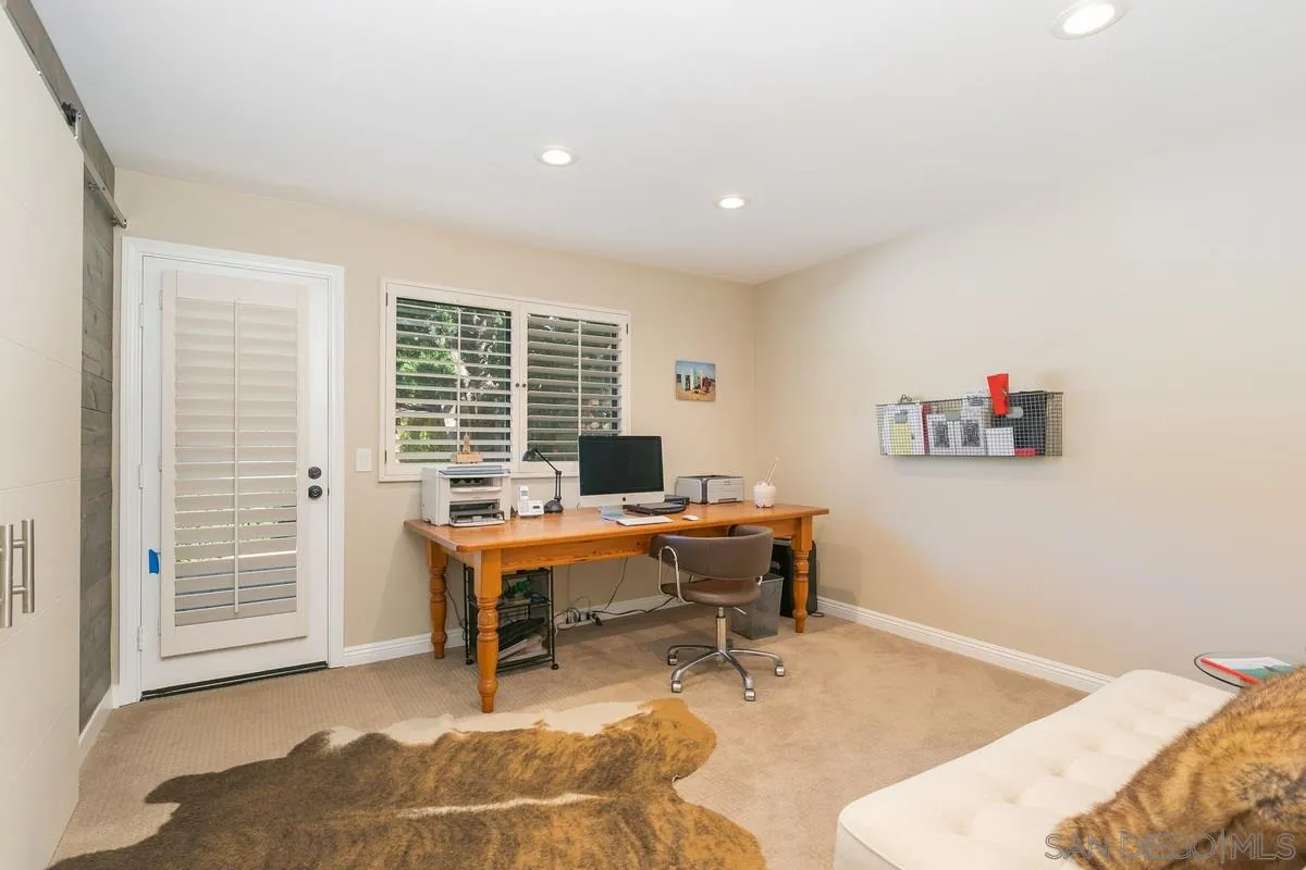 1122 Rancho Encinitas Drive Encinitas, CA 92024 - Photo 28 of 39 a workspace with furniture and a window