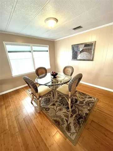 a large kitchen with white cabinets