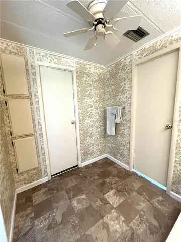 a dinning table and chairs in a patio