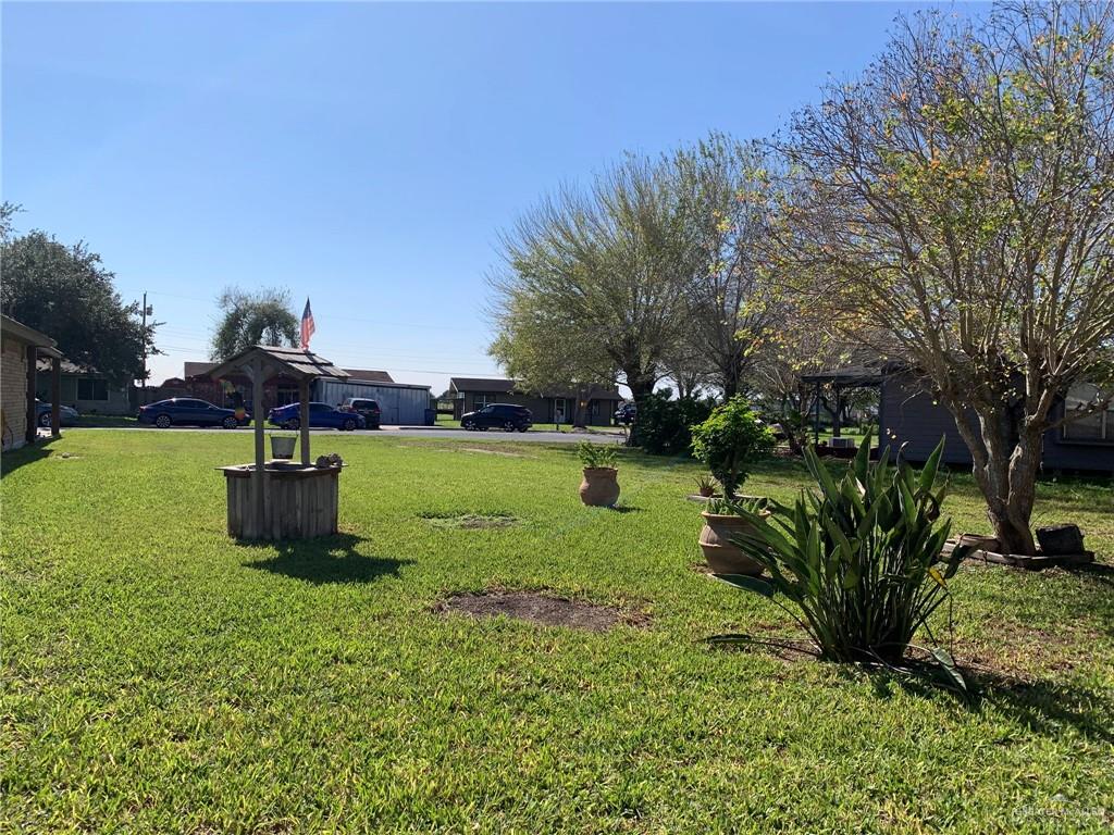 0 Wayne Place Harlingen, TX 78552 - Photo 3 of 11 a view of a garden with a fountain