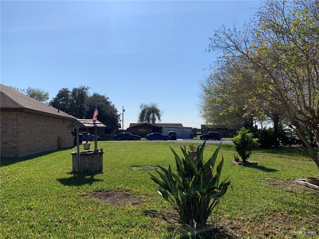 0 Wayne Place Harlingen, TX 78552 - Photo 4 of 11 a view of a garden with a fountain