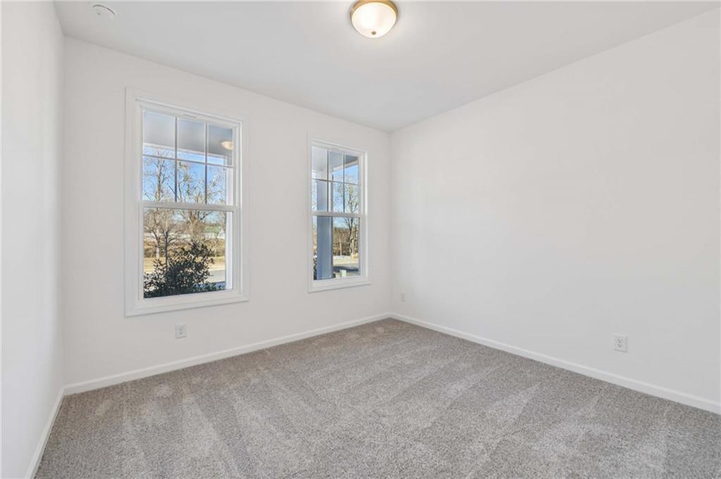 280 Silverleaf Trail Bethlehem, GA 30620 - Photo 20 of 40 an empty room with windows