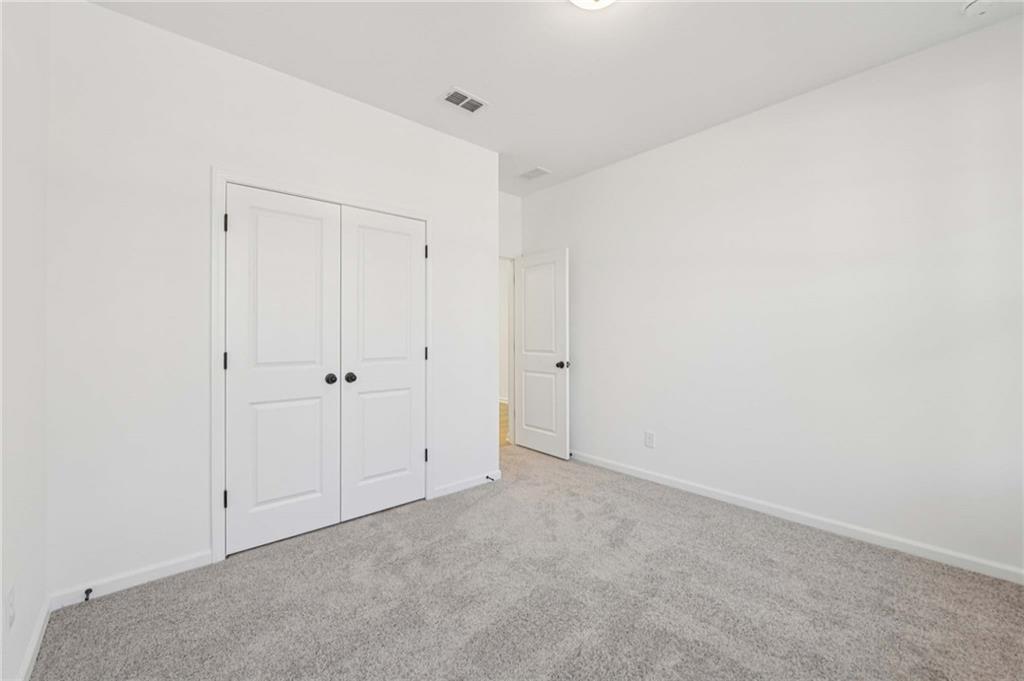 280 Silverleaf Trail Bethlehem, GA 30620 - Photo 21 of 40 a view of an empty room