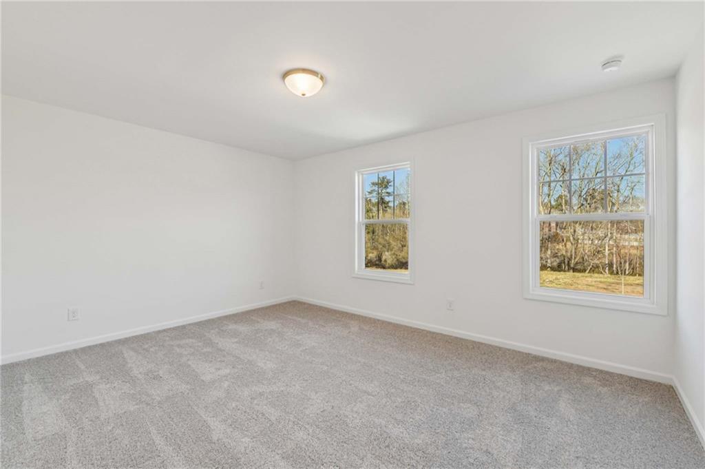 280 Silverleaf Trail Bethlehem, GA 30620 - Photo 23 of 40 an empty room with windows