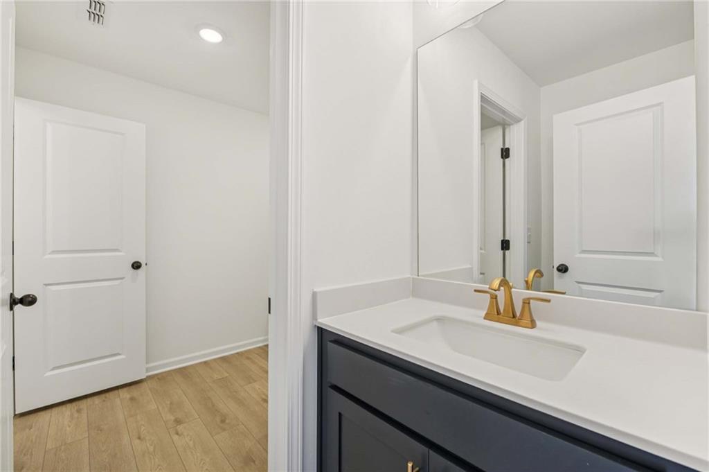 280 Silverleaf Trail Bethlehem, GA 30620 - Photo 26 of 40 a bathroom with a sink and a mirror