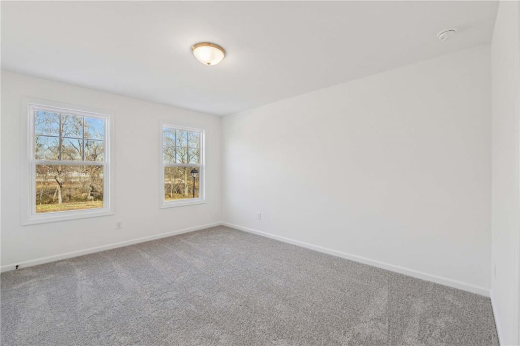 280 Silverleaf Trail Bethlehem, GA 30620 - Photo 27 of 40 an empty room with windows